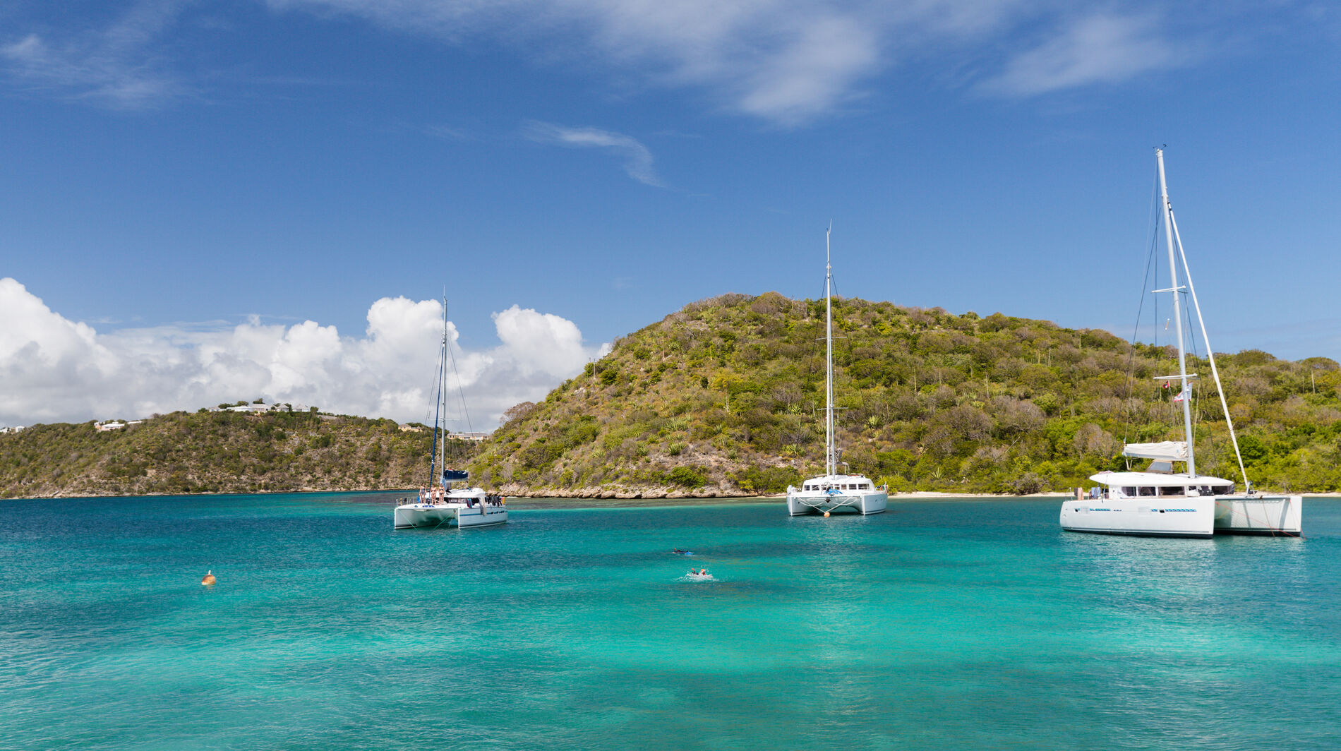 three catamarans in caribbean